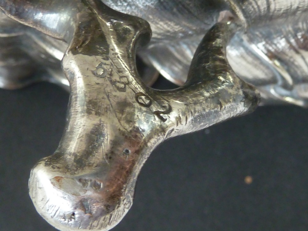 A Victorian electroplated nickel silver spoon warmer styled in the form of a nautilus shell supported by a cast coral branch base. View VII