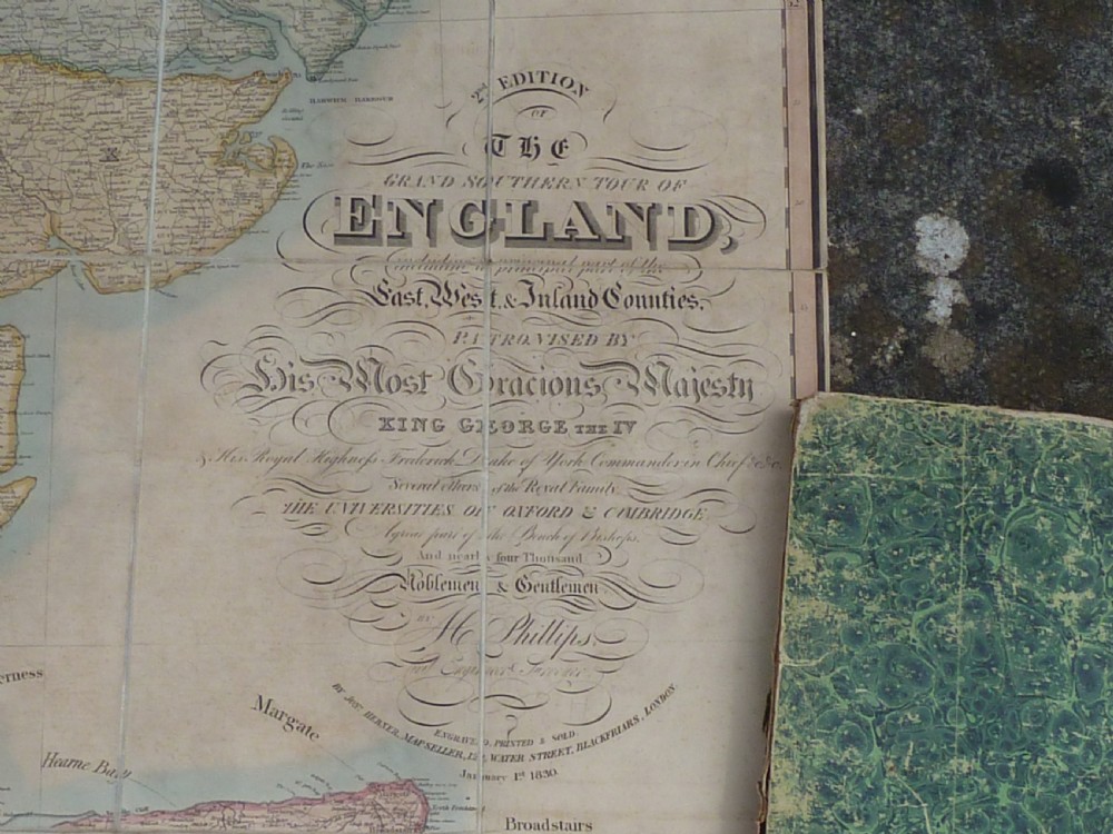 A hand-coloured 1830 dissected paper map of Southern England mounted on a linen backing displaying county borders. View II