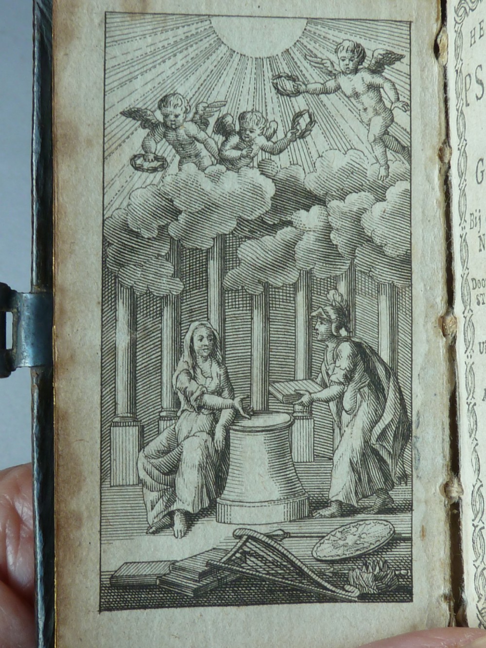 An eighteenth-century miniature Dutch leather-bound psalm book with gilt page edges and a silver metal clasp closure. View VIII