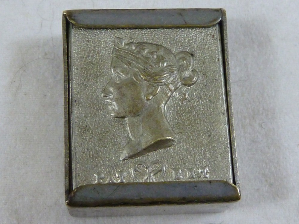 A small rectangular silver-plated stamp box featuring an embossed relief portrait of Queen Victoria in profile on the lid. View III