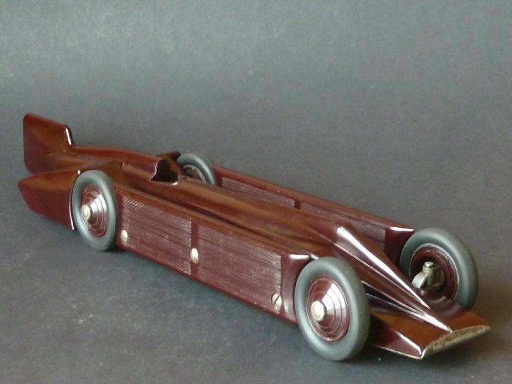 Golden Arrow Land Speed Record Bakelite clockwork toy by A.G.Ltd Patented 1929