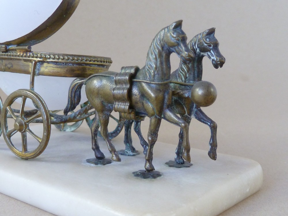 A French Palais Royal style miniature horse-drawn carriage featuring a white opaline glass egg-shaped casket mounted on a gilt metal frame and alabaster base. View VII
