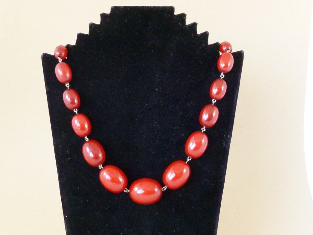 66g Bakelite Faux Cherry Red Amber Cloudy Bead Necklace