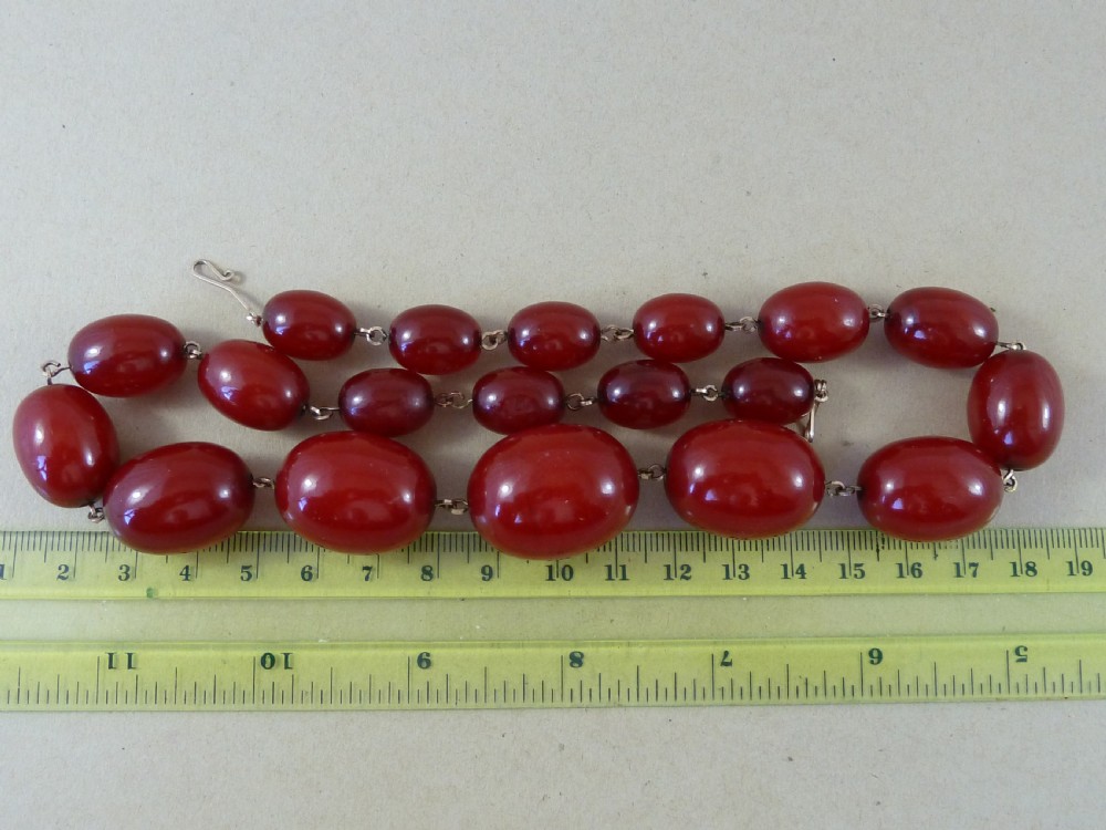 66g Bakelite Faux Cherry Red Amber Cloudy Bead Necklace View III