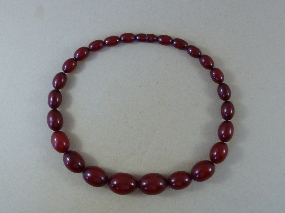 46g Bakelite Faux Cherry Red Amber Cloudy Bead Necklace View II