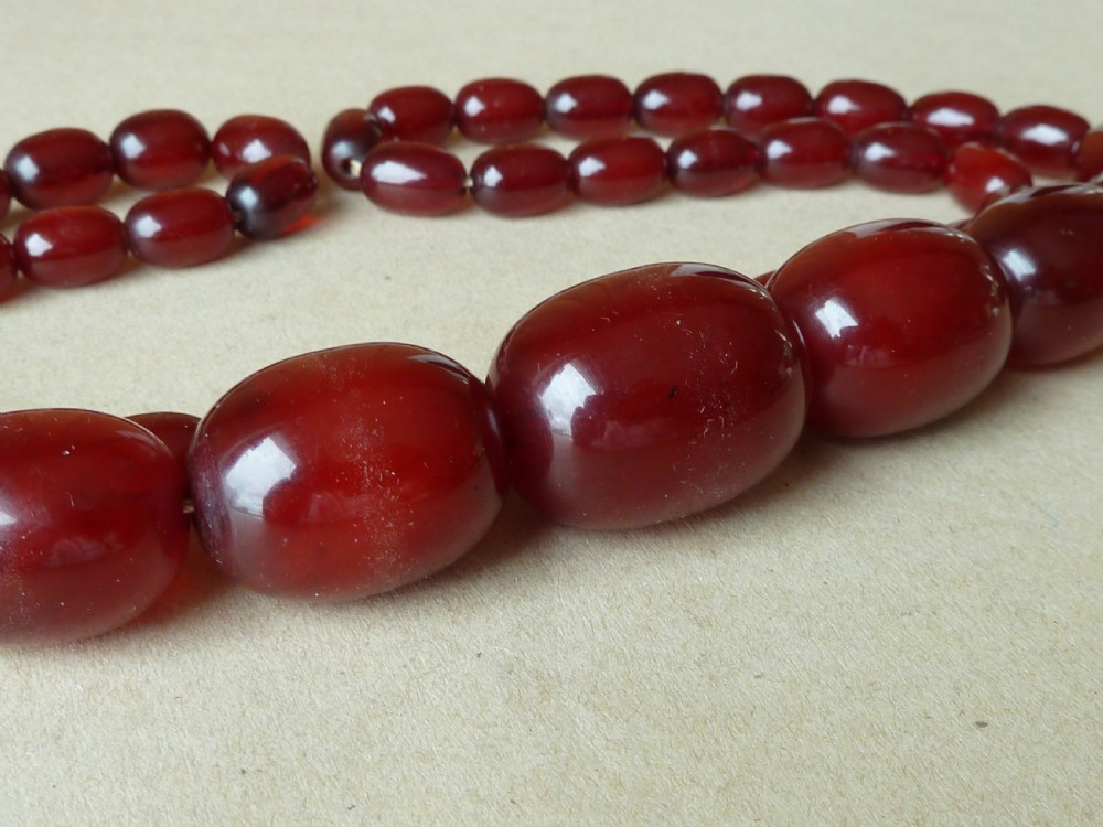 72 Grams Bakelite Faux Cherry Red Amber Bead Necklace View V