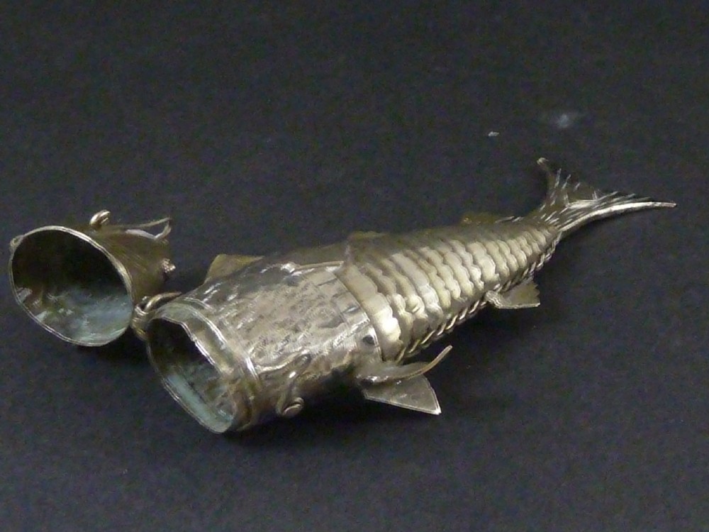 An articulated silver spice box crafted in the form of a detailed fish with overlapping scales and fins. View V