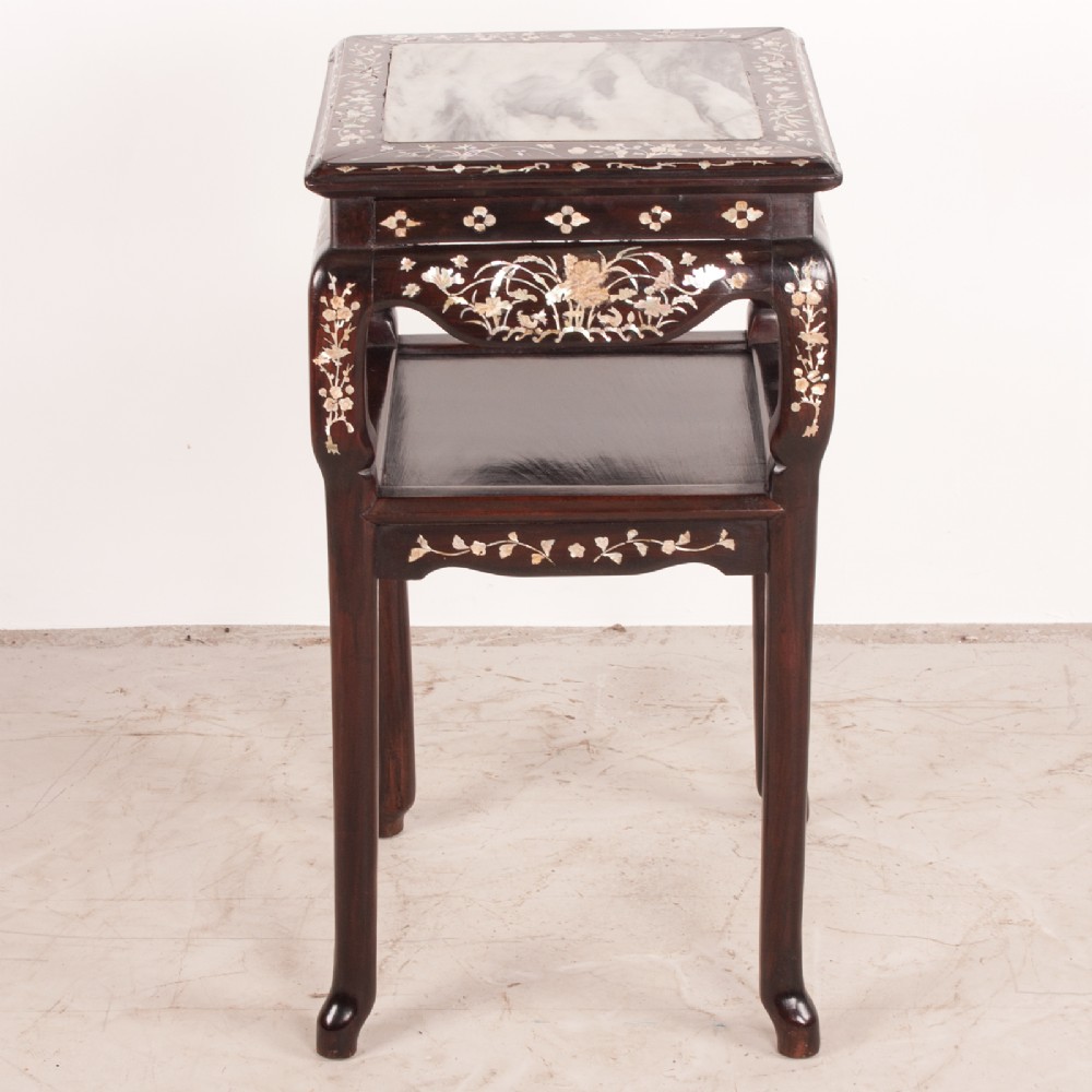 A square dark timber Chinese occasional table with mother-of-pearl inlay, a lower tier, and an inset grey marble top. View VII