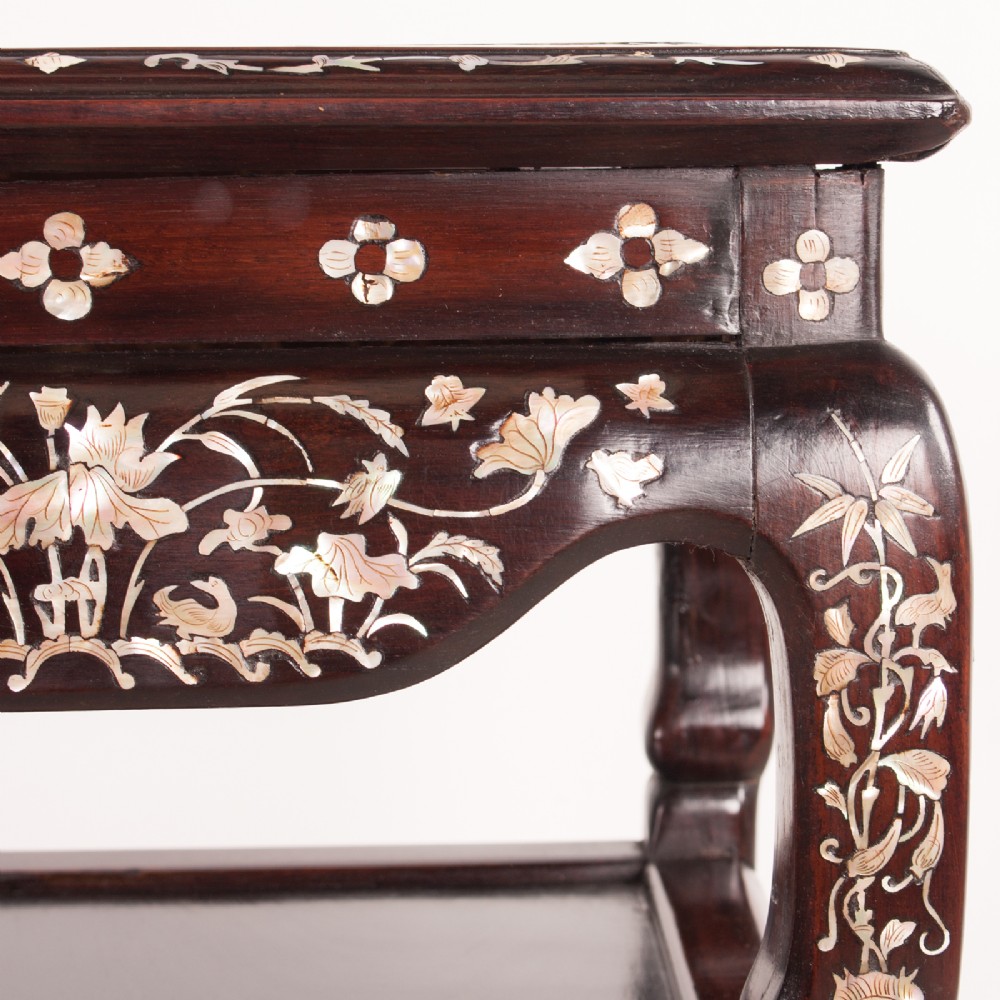 A square dark timber Chinese occasional table with mother-of-pearl inlay, a lower tier, and an inset grey marble top. View X