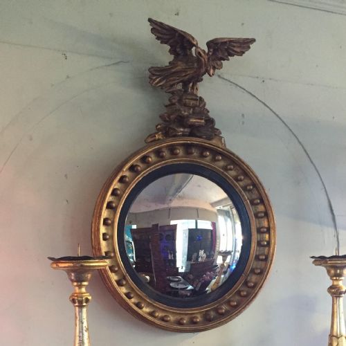 a large regency convex mirror - CATEGORY: ANTIQUE MIRRORS - DATED 19TH CENTURY