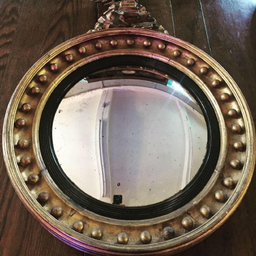 A LARGE REGENCY CONVEX MIRROR - ADDITIONAL PHOTO 1