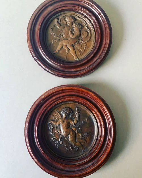 a pair of19thc bronze plaques depicting cherubs - CATEGORY: ANTIQUE METAL - DATED 1900