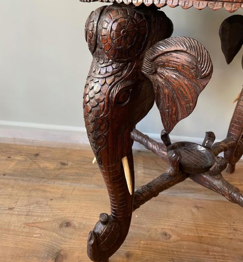 A WONDERFULLY CARVED INDIAN ELEPHANT TABLE - ADDITIONAL PHOTO 1