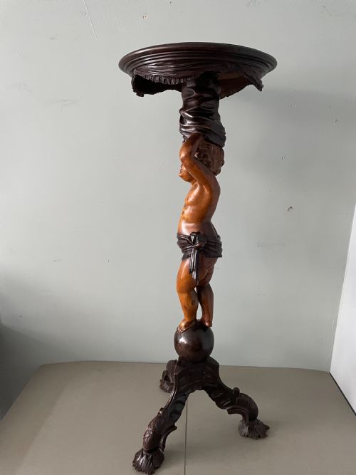 A VENETIAN CHERUB FIGURAL TABLE - ADDITIONAL PHOTO 1