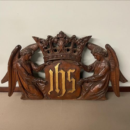 a 19th oak carving of two angels holding aloft the monogram of christ - CATEGORY: ANTIQUE MISCELLANEOUS - DATED 19TH CENTURY