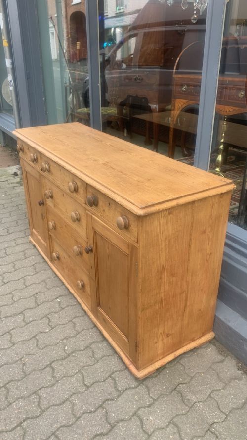 AN ANTIQUE PINE DRESSER BASE - ADDITIONAL PHOTO 1