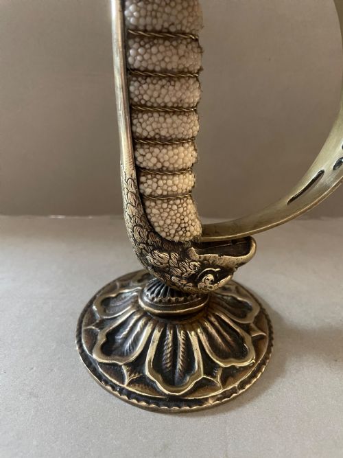 AN ANTIQUE PAIR OF SWORD CANDLESTICKS - ADDITIONAL PHOTO 2