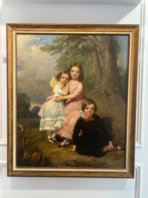 A ANTIQUE PORTRAIT OF CHILDREN