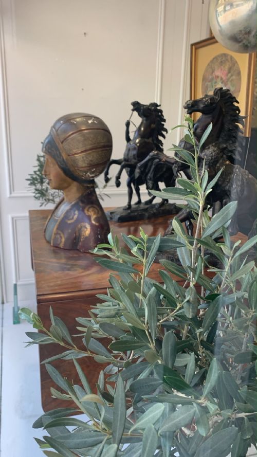 Late nineteenth-century polychrome and gilded bust depicting a noblewoman in a Renaissance-style patterned headdress and decorated gown. View VIII