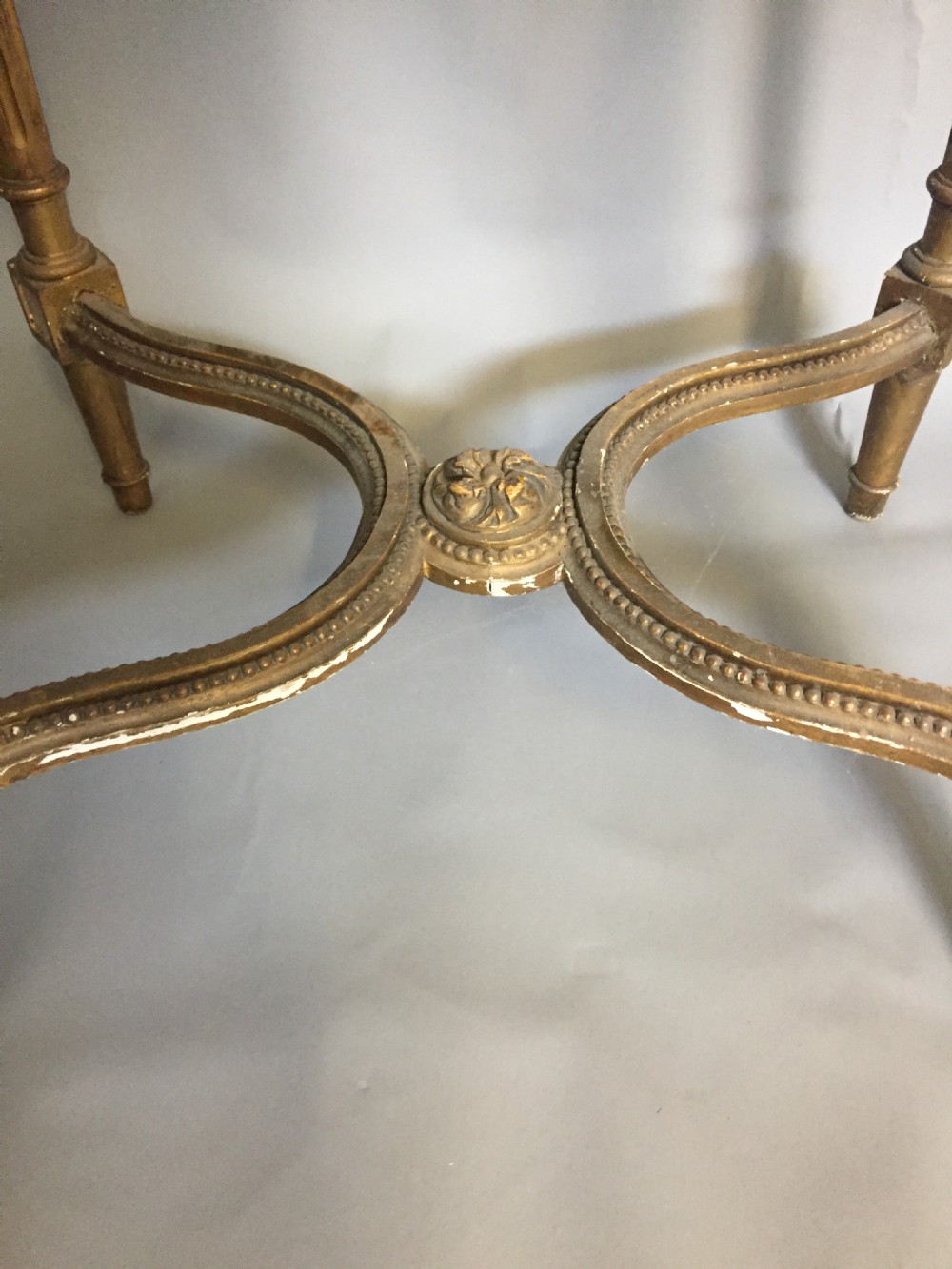 An elegant early 20thC giltwood marble topped lamp table View V