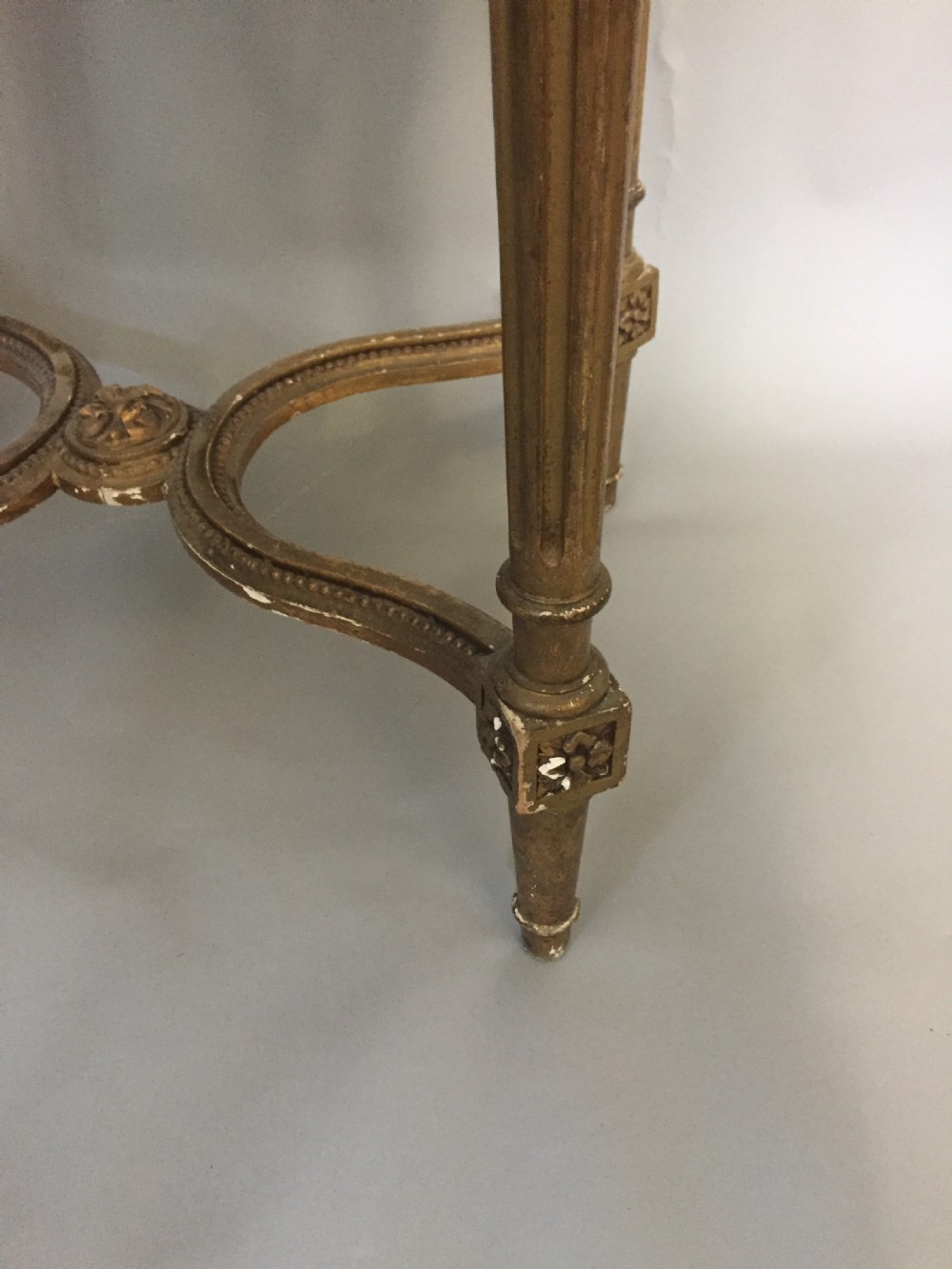An elegant early 20thC giltwood marble topped lamp table View VI