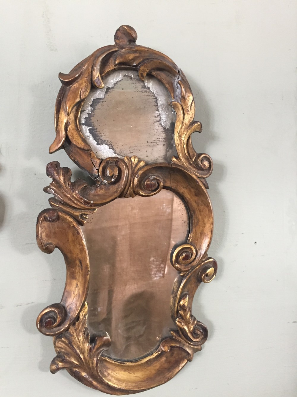 A very attractive pair of 18thc Florentine carved and gilded wood mirrors View III