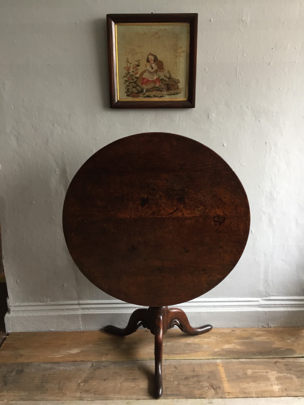 An 18th oak tripod, tilt top table