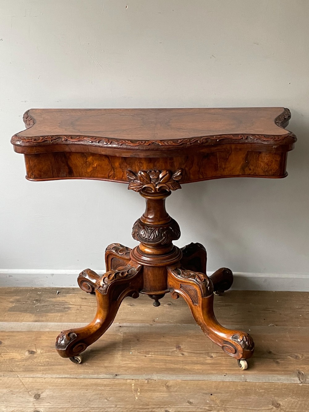 A 19thC Serpentine burr walnut card table