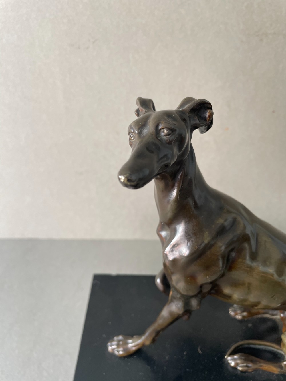A 19thC Bronze model of a Greyhound View V
