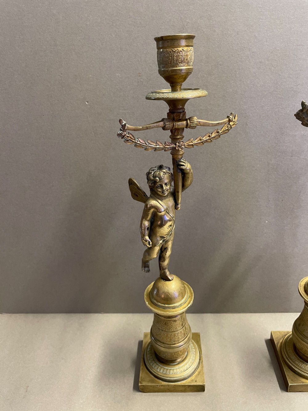 A pair of French Empire candlesticks View II