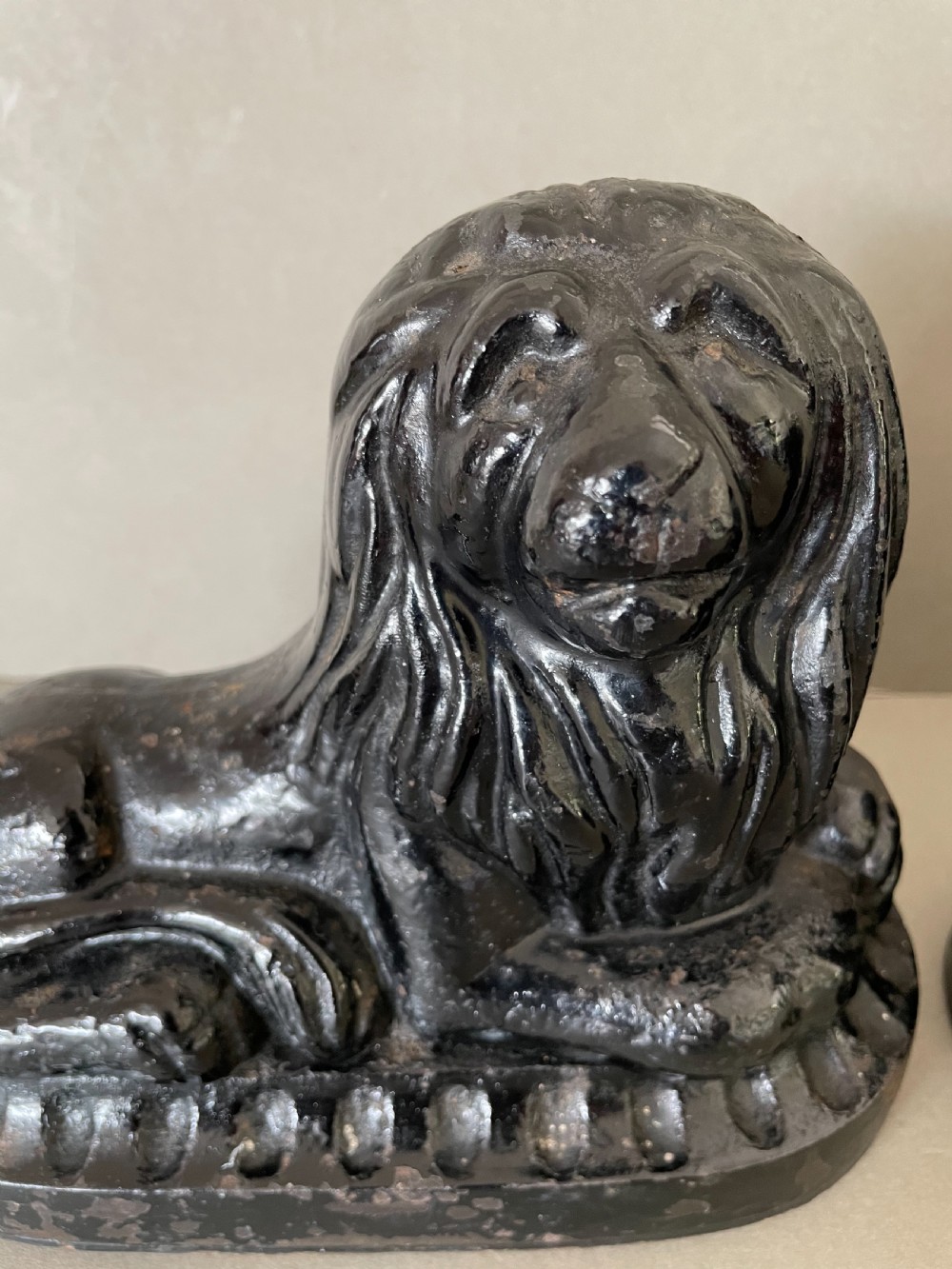 A pair of 19thC cast iron lion door porters View II