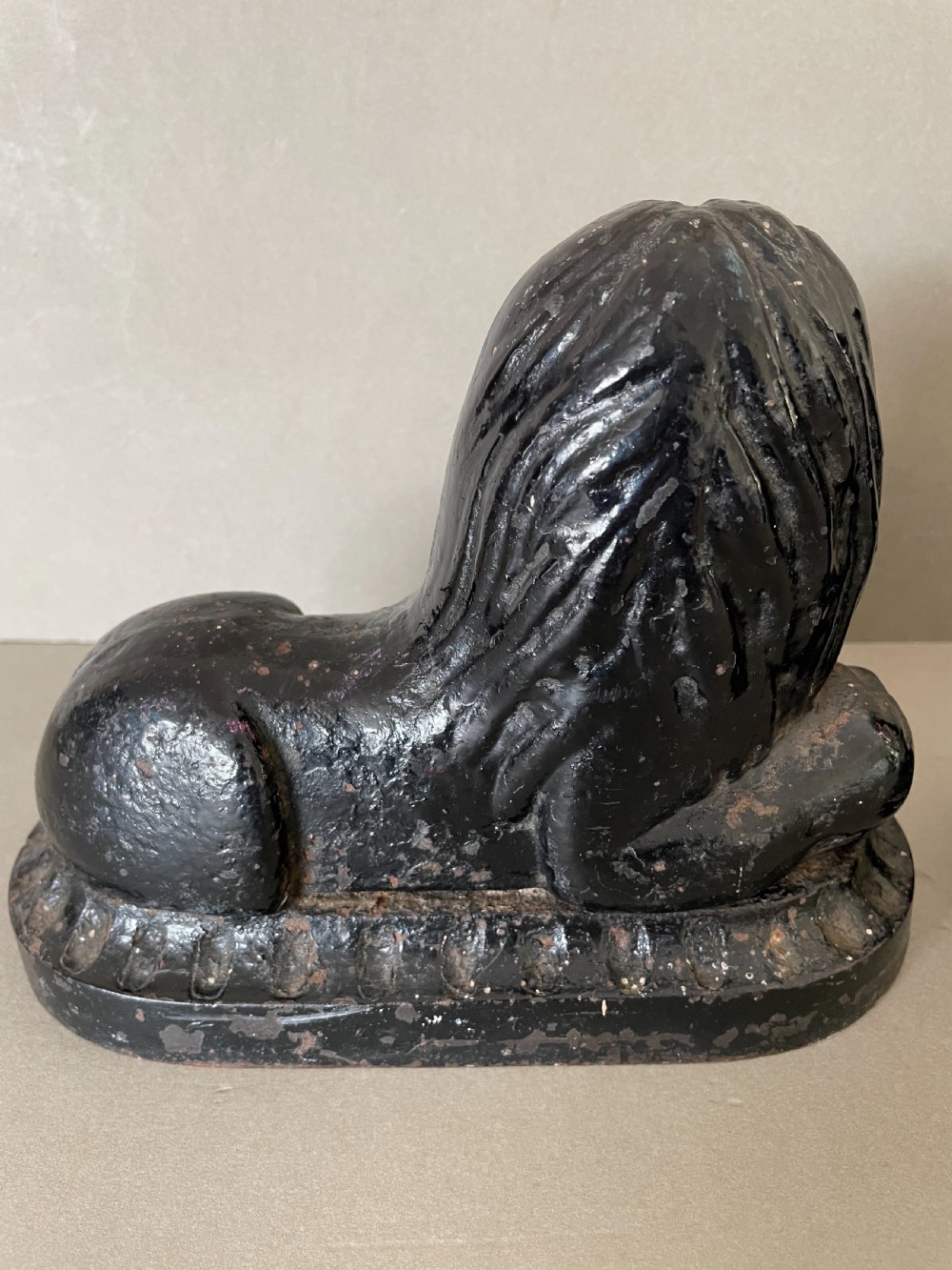 A pair of 19thC cast iron lion door porters View VI