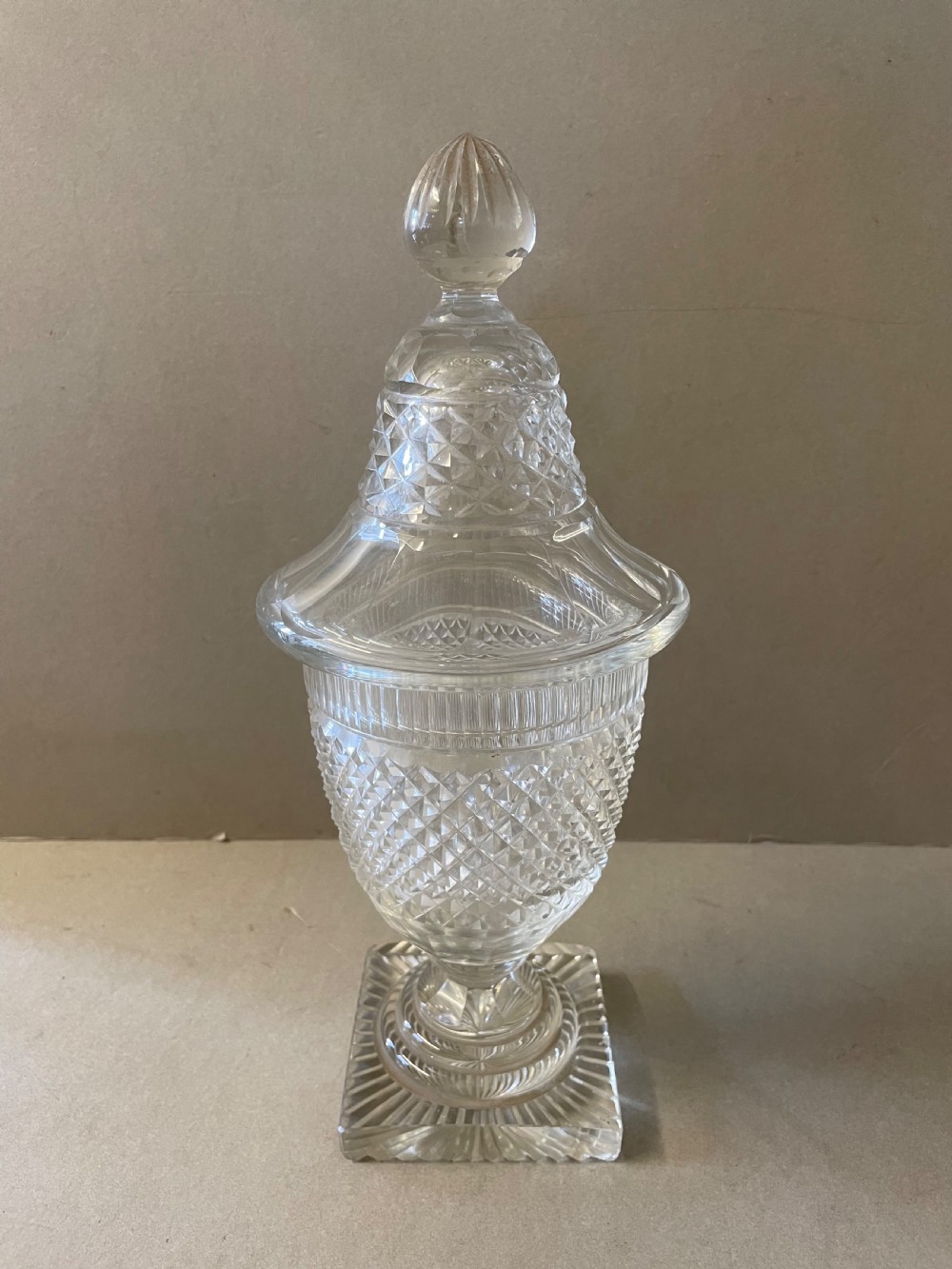 An Antique Cut Glass Jar and Cover