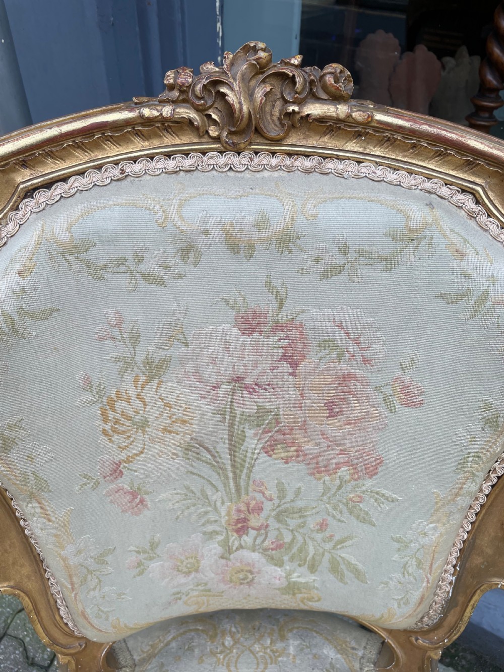 An Antique pair of giltwood elbow chairs View II