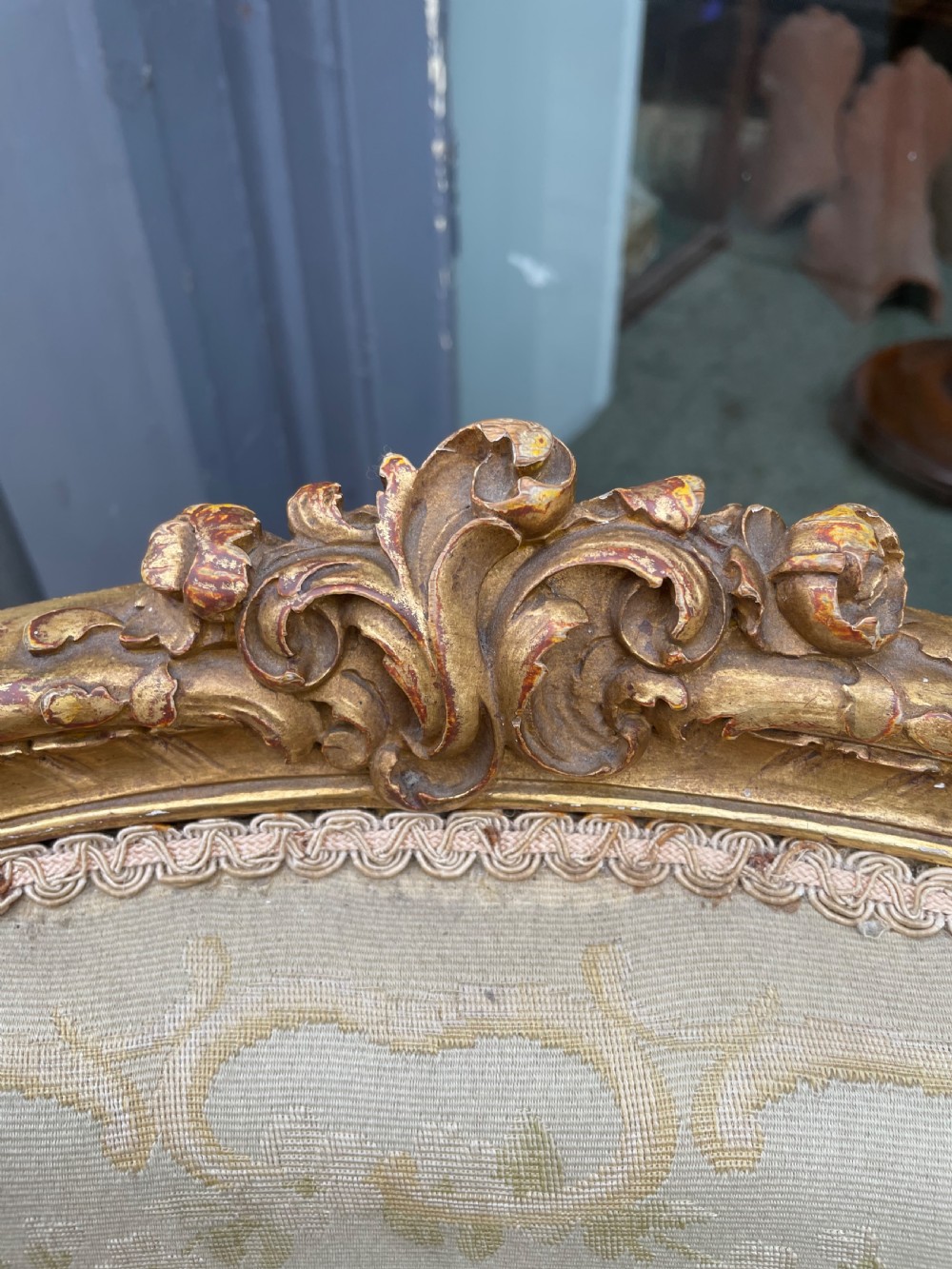 An Antique pair of giltwood elbow chairs View V