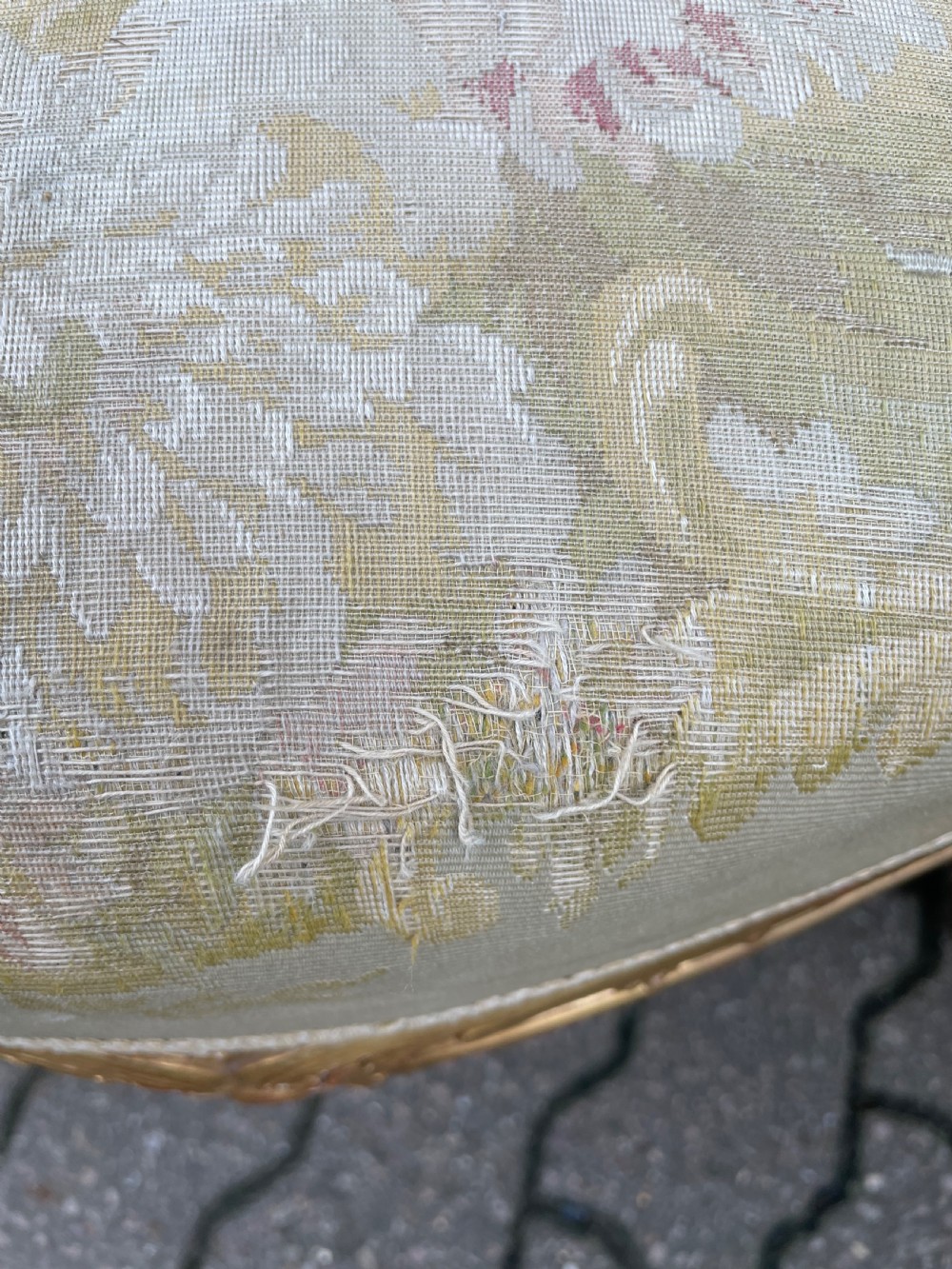 An Antique pair of giltwood elbow chairs View X