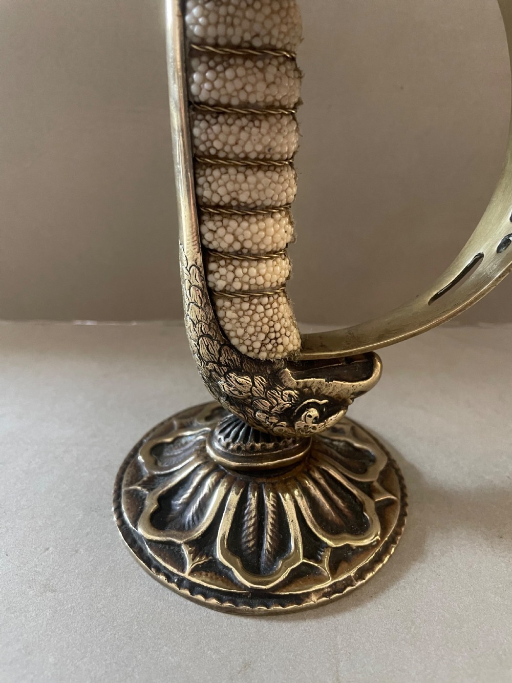 An antique pair of sword candlesticks View III