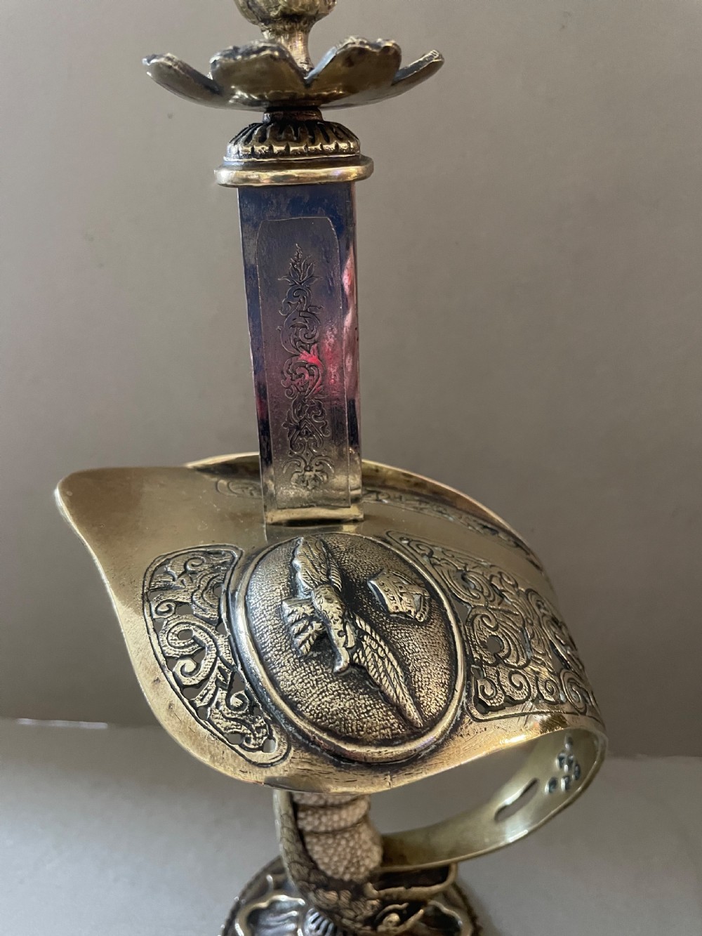 An antique pair of sword candlesticks View IV