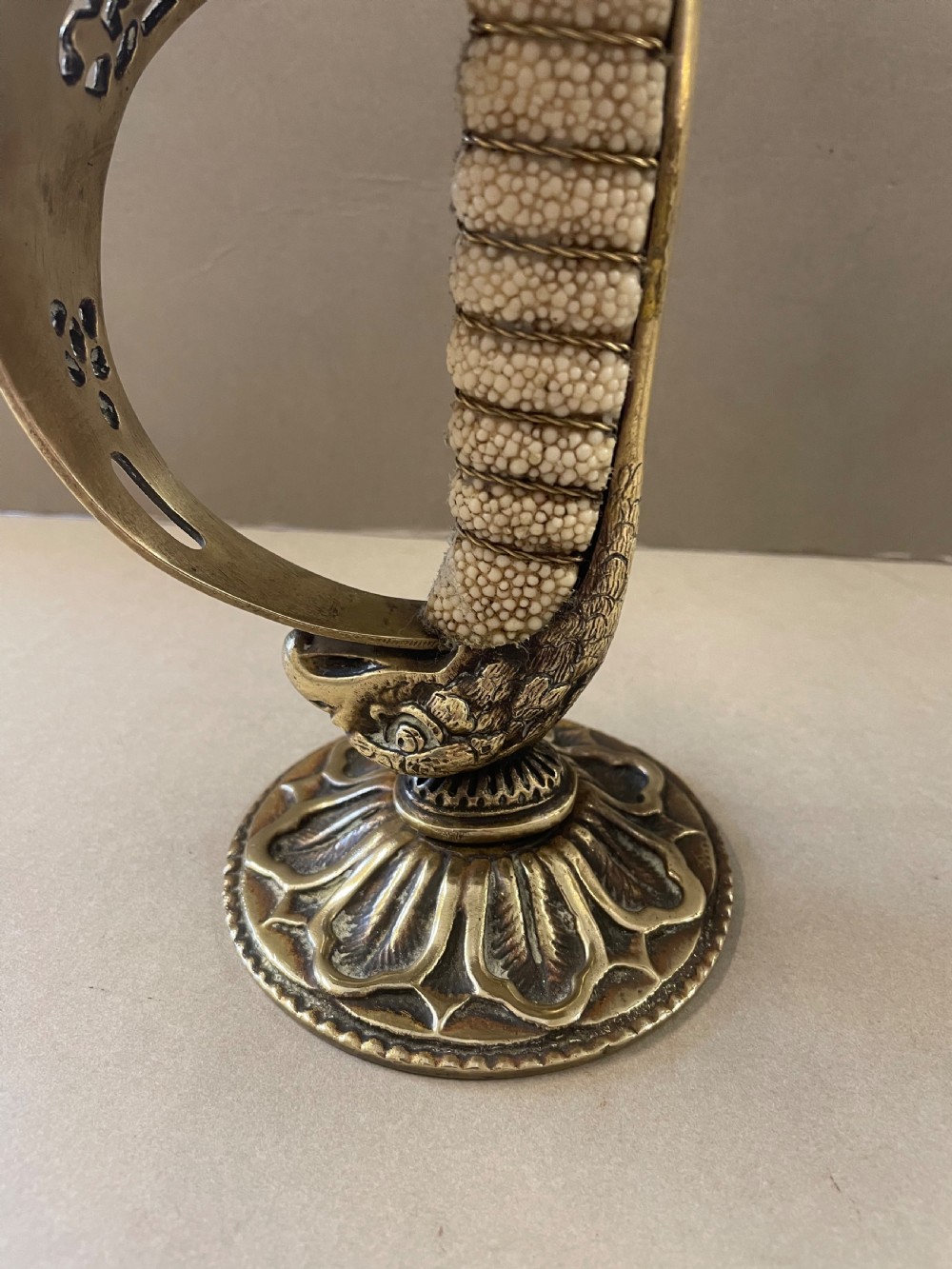 An antique pair of sword candlesticks View IX