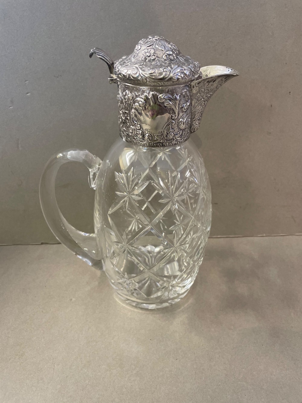 An Antique Silver Claret Jug