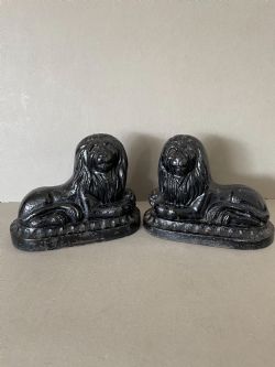 A PAIR OF 19THC CAST IRON LION DOOR PORTERS