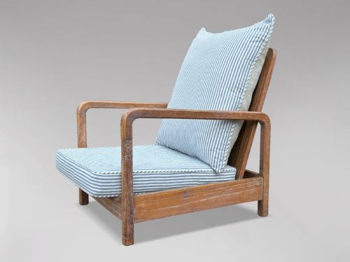 fig 1. PAIR OF RECLINING ARMCHAIRS IN THE MANNER OF LIBERTY & CO
