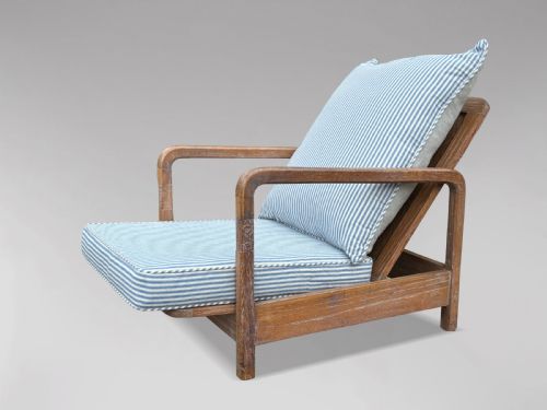 fig 2. PAIR OF RECLINING ARMCHAIRS IN THE MANNER OF LIBERTY & CO
