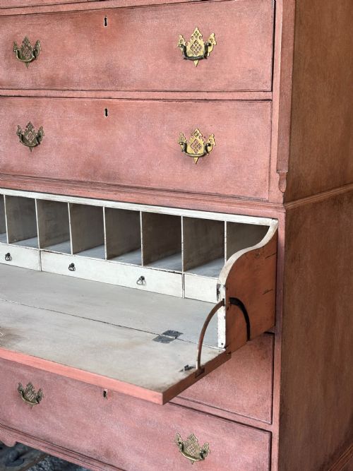 fig 2. An 18th-century George III painted secretaire tallboy with brass hardware and an open drop-front writing compartment disclosing fitted pigeonholes.