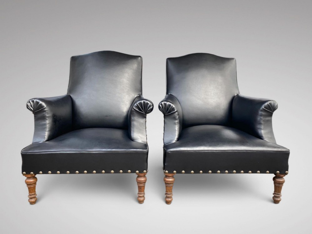 PAIR OF 19TH CENTURY BLACK LEATHER LIBRARY ARMCHAIRS