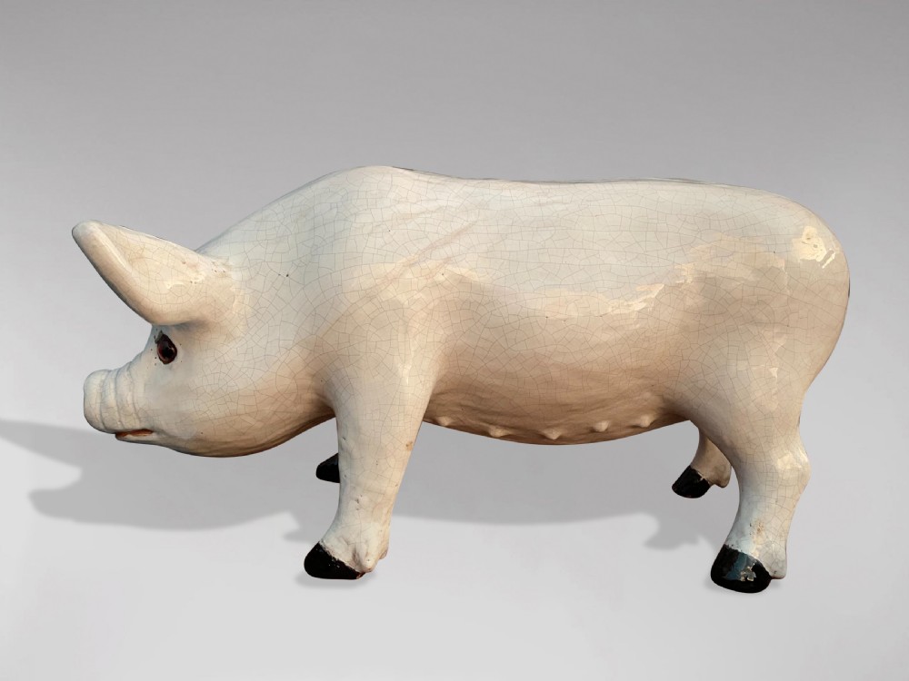19TH CENTURY CERAMIC PIG SCULPTURE FROM BAVENT IN NORMANDY