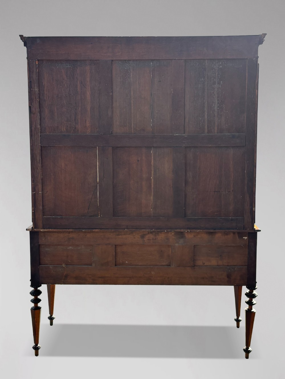 A 19th-century French maple bureau bookcase featuring a top glazed two-door display section above a kneehole writing desk with leather inset panels and turned legs. View VIII
