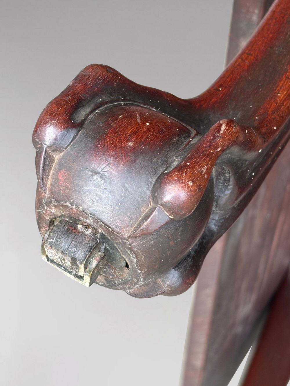An 18th-century George II mahogany drop-leaf table featuring two hinged leaves, cabriole legs, and carved claw and ball feet. View VII