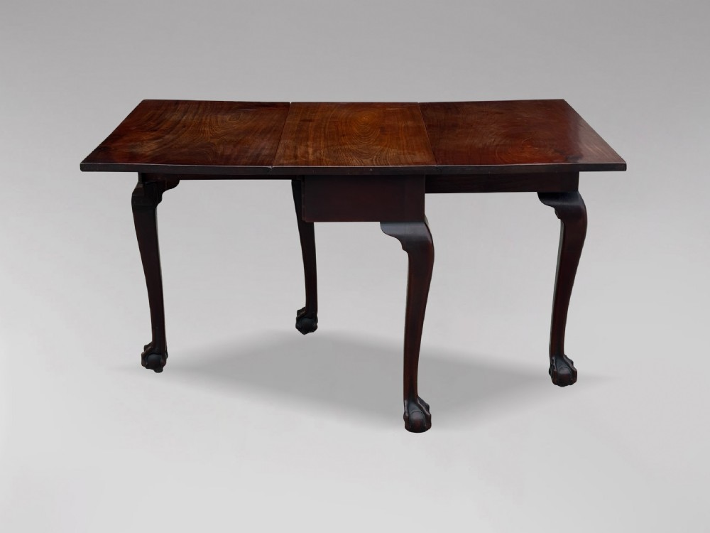 An 18th-century George II mahogany drop-leaf table featuring two hinged leaves, cabriole legs, and carved claw and ball feet. View VIII