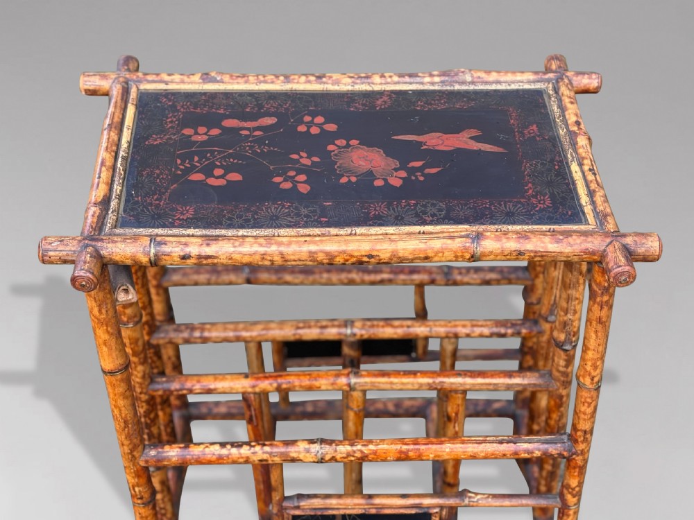 A late 19th-century tiger bamboo side table with a hand-painted lacquered top and integrated lower magazine rack dividers. View II